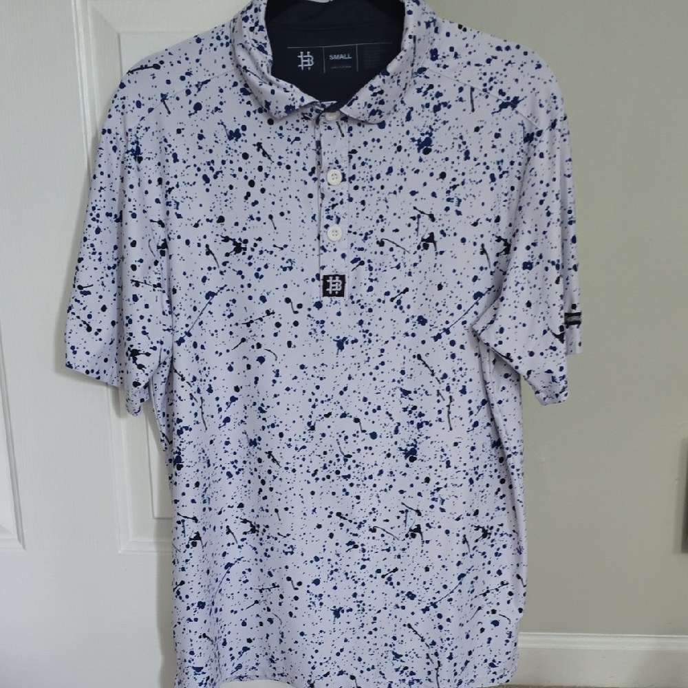 Blue and White Artistic Polo Shirt with Speckled Design